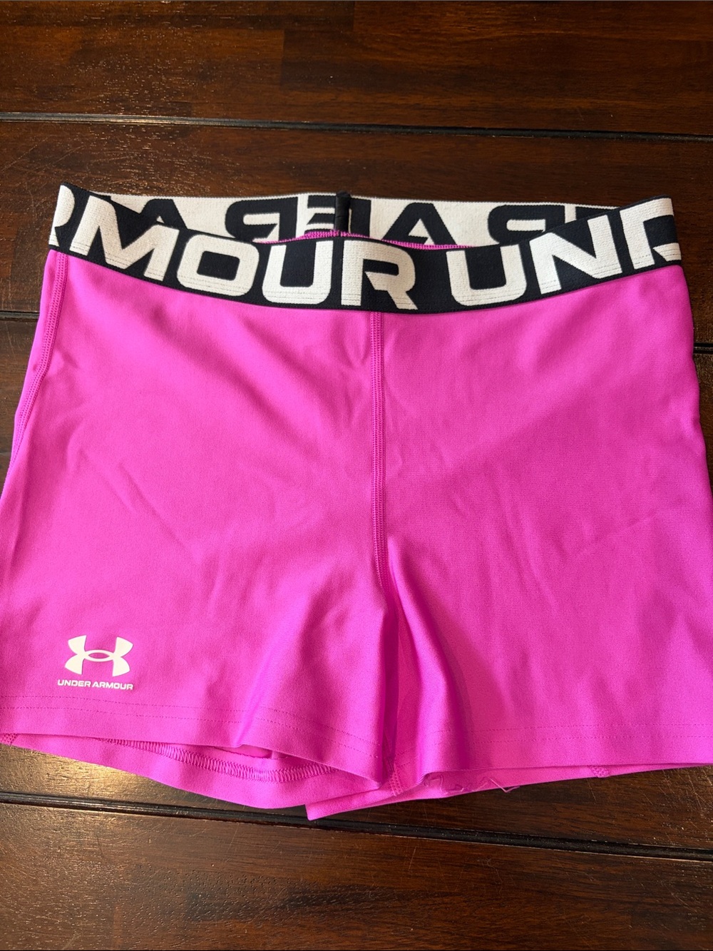 Under Armour Bright Pink Performance Shorts with Black Waistband